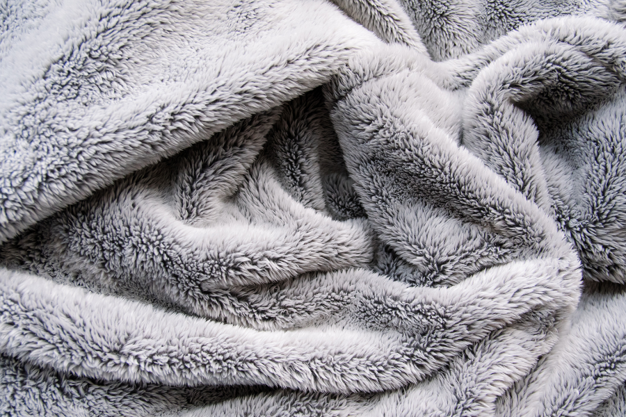 The Benefits of Weighted and Oversized Blankets: Why Bigger is Better